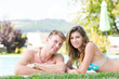 © william87 - Beautiful Young Couple Next to Swimming Pool
