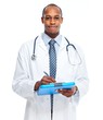 © grinny - African american doctor writing prescription.