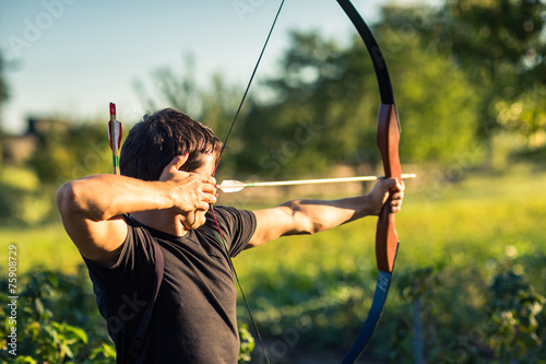Cuadros en Lienzo Young archer training with the bow