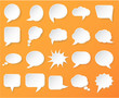 © stanok - Shiny white paper bubbles for speech on an orange background.