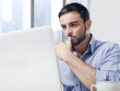 © Wordley Calvo Stock - attractive businessman working on computer at office desk