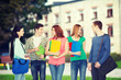 © Syda Productions - group of smiling students standing