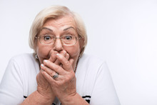 Elderly Woman Closes Her Mouth, Ears And Eyes With Hands