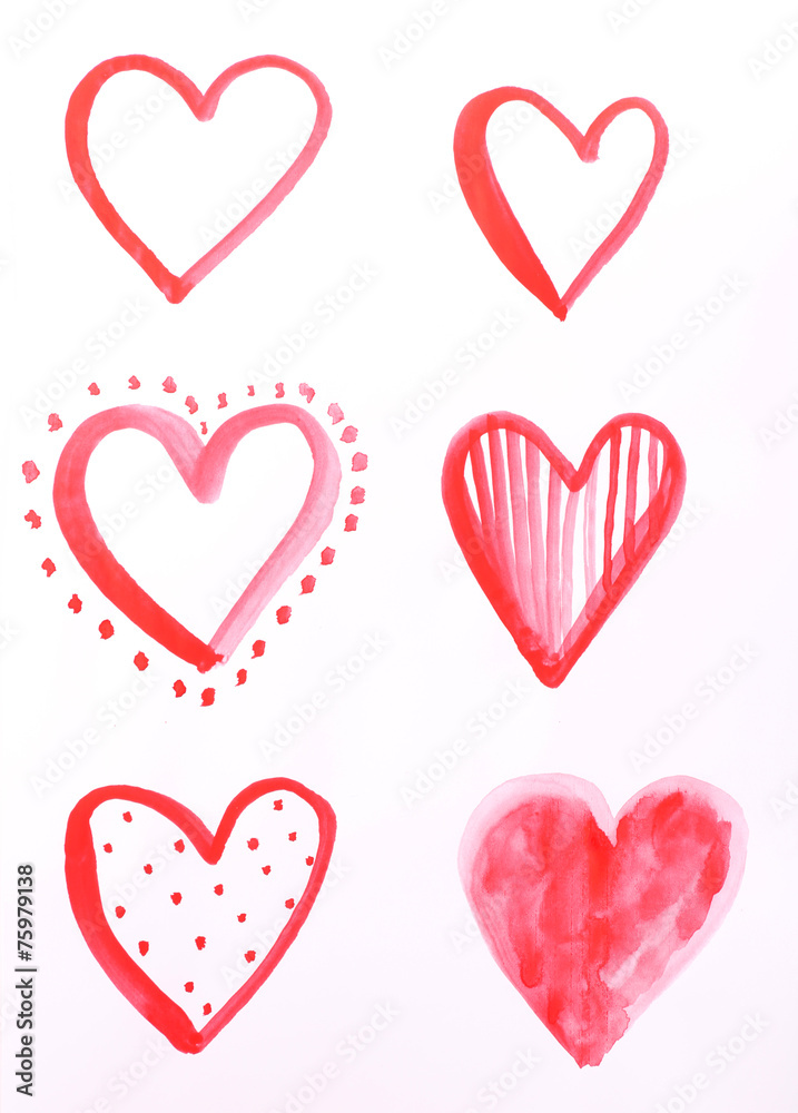 Painted hearts on sheet of paper isolated on white