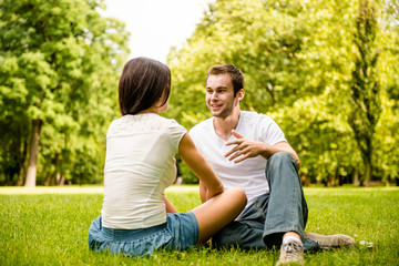 Young couple talking outdoor