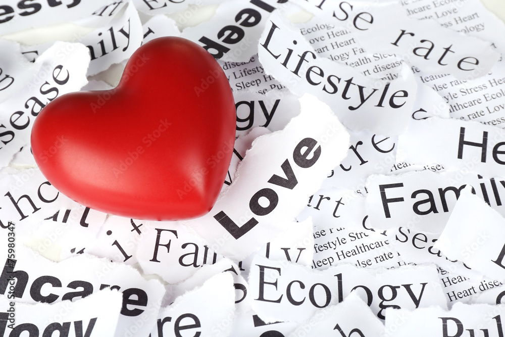 Decorative heart on background of paper notes