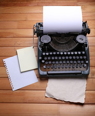 Wall Mural - Antique Typewriter. Vintage Typewriter Machine on wooden table