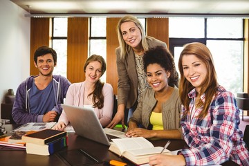 Poster - Student smiling at the camera with their teacher