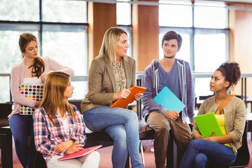Poster - happy students talking with their teacher