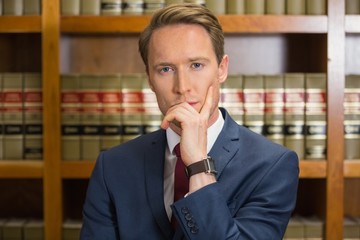 Wall Mural - Lawyer frowning in the law library