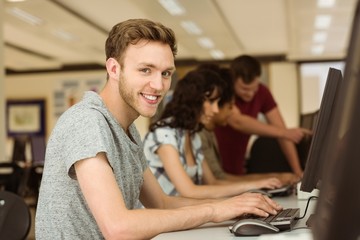 Wall Mural - classmates working in the computer room