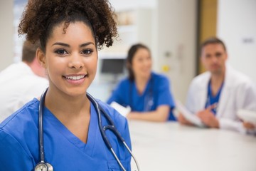 Wall Mural - medical student smiling at the camera during class
