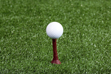 Sticker - Golf ball on green grass outdoor close up