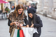 © william87 - Happy Women with Shopping Bags in the City