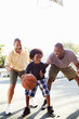 © Monkey Business - Grandfather With Son And Grandson Playing Basketball
