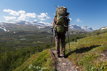 hiker with backpack in sweden