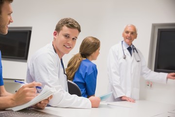 Wall Mural - medical professor teaching young students