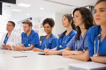Wall Mural - medical student smiling at the camera during class