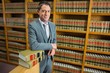 © WavebreakmediaMicro - Lawyer standing in the law library