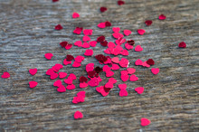 Heart Confetti On Wood Table /glitter Background