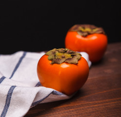 two persimmons