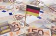 Flag of Germany sticking in 50 Euro banknotes.(series)
