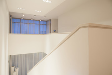 Wall Mural - Interior of bright staircase inside apartment