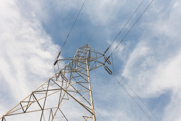 The transmission tower on blue sky background