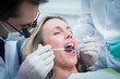 © WavebreakmediaMicro - Close up of woman having her teeth examined