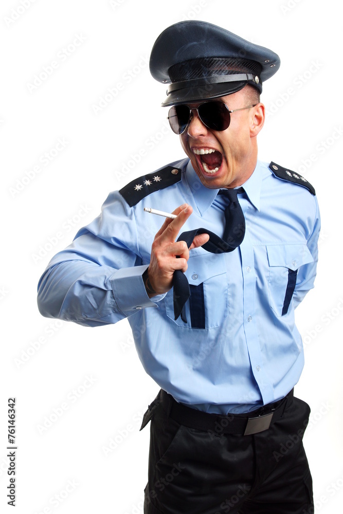 Angry policeman smoking cigarette on white background Stock Photo