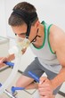 © WavebreakMediaMicro - Man doing fitness test on exercise bike