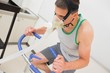 © WavebreakMediaMicro - Man doing fitness test on exercise bike