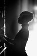 Silhouette of a beautiful actress on the backstage, monochrome