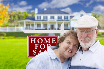 Wall Mural - Happy Senior Couple Front of For Sale Sign and House