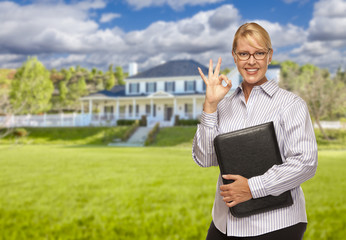 Wall Mural - Attractive Businesswoman In Front of Nice Residential Home