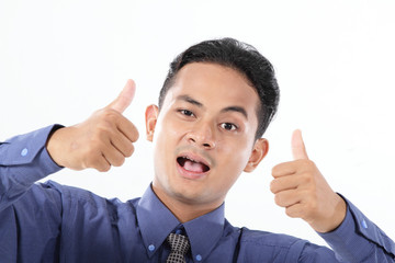 happy young business man at workwith thumb up, isolated on white