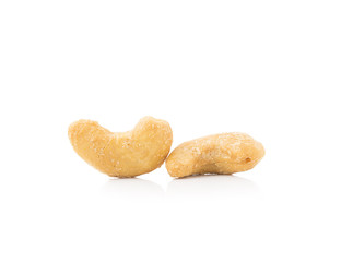 cashew with salt on white background