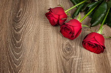 Red Rose Flower On Wood
