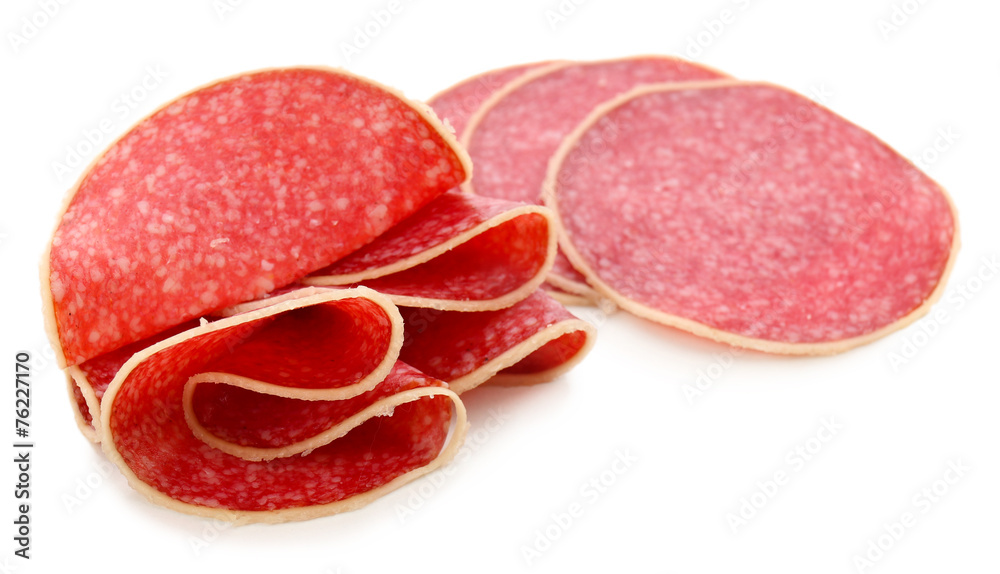 Slices of salami isolated on white background