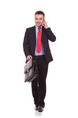 Poster - Young business man walking forward