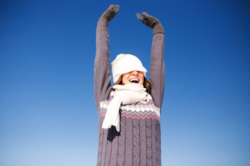 Wall Mural - Portrait of happy young woman have fun at beautiful sunny winter