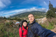 © Sergo - Young family hiking in the mountains.