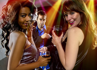 women seducing a man at a bar or nightclub