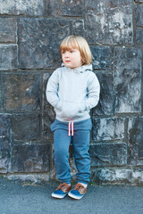 Wall Mural - Outdoor portrait of a cute little boy