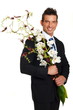 © petrdlouhy - Handsome businessman in suit with flowers orchid