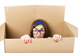 © rodjulian - Woman hiding in a moving box