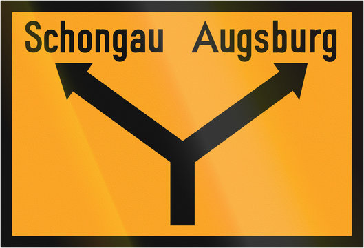 Old design (1936) of a German direction sign on a federal road showing the way to Schongau and Augsburg