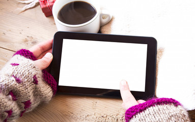 Tablet Touchscreen and Coffee Cup