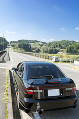 Sticker - 直線道路と車のリアビュー