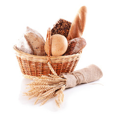 Canvas Print - Different bread in wicker basket isolated on white